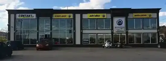 A Contant.ca dealership with Can-Am, Ski-Doo, and Sea-Doo signage