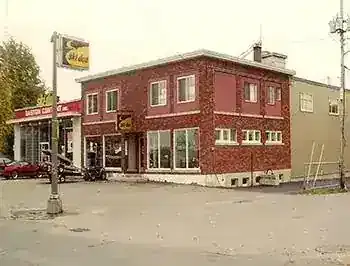 The red-brick building of one of Contant's earlier dealerships