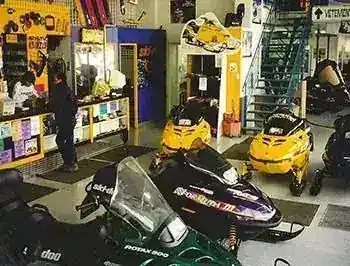 A Contant showroom filled with snowmobiles
