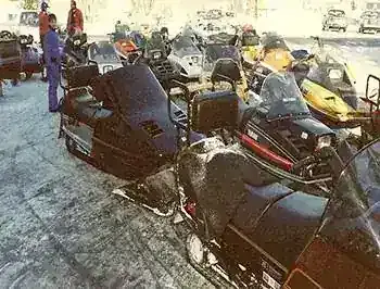 A lineup of snowmobiles at a Ski-Doo ride, in the early days