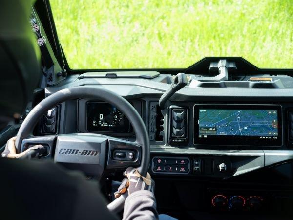 Can-Am Defender dashboard with the 10.25-in. touch display showing navigation