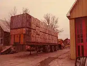 Ski-Doo crates being delivered — used to build Contant's very first building